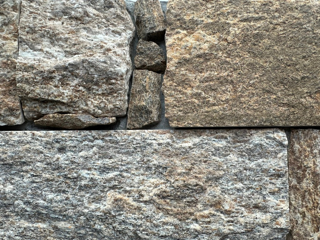 EROSION BROWN Granite Split-face irregular rectangles, glued on cement board, interlocking Wall Veneer