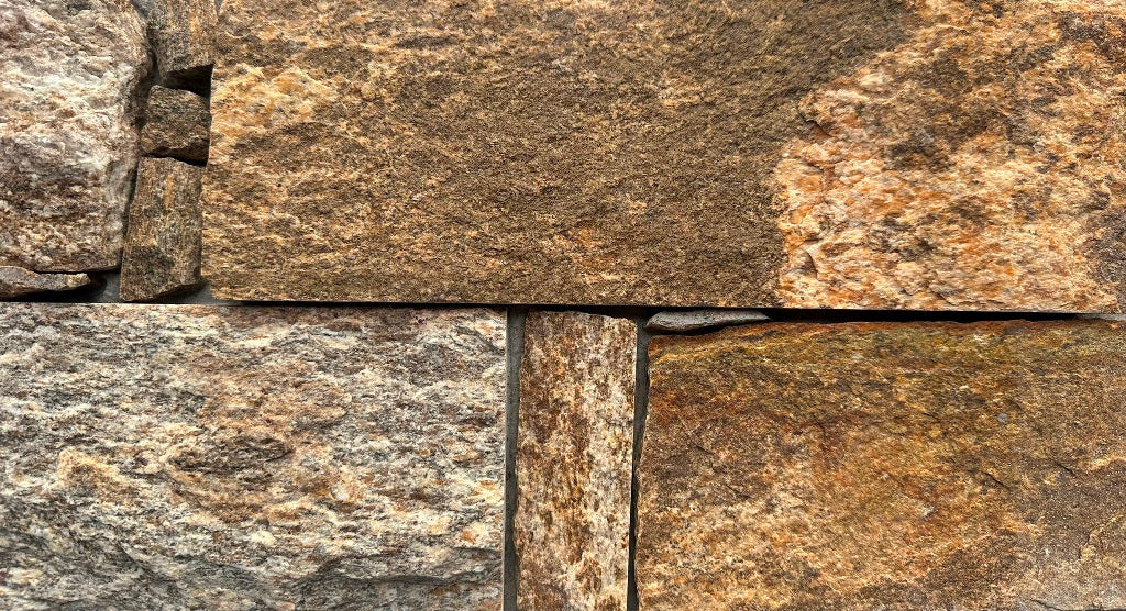 EROSION BROWN Granite Split-face irregular rectangles, glued on cement board, interlocking Wall Veneer