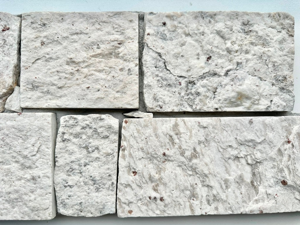 EROSION WHITE Granite Split-face irregular rectangles, glued on cement board, interlocking Wall Veneer