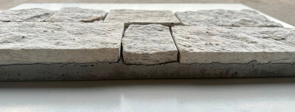 EROSION WHITE Granite Split-face irregular rectangles, glued on cement board, interlocking Wall Veneer